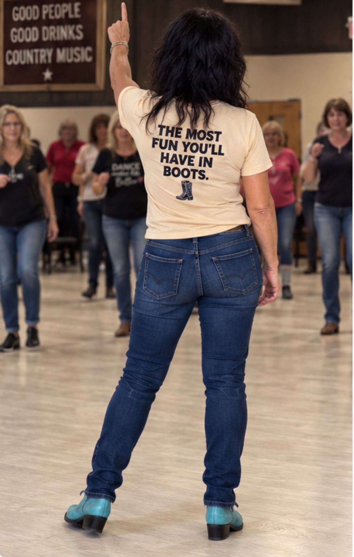 Nicole in her “The most fun you’ll have in boots” shirt leading a Boots on the Ground class